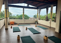 Meditation hall arranged with cushions and shoji screens